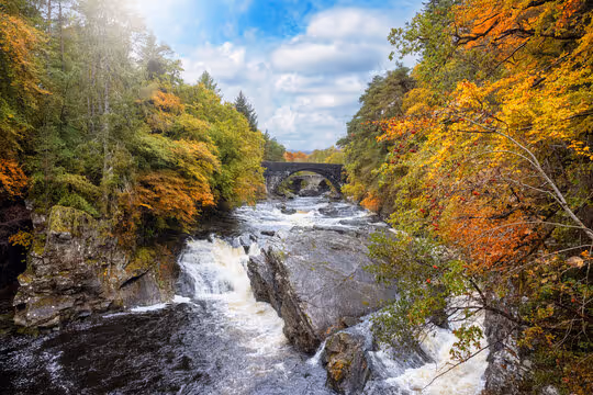 Invermoriston Falls in autumn, the Moriston dropping through the gorge under Telford’s old stone bridge