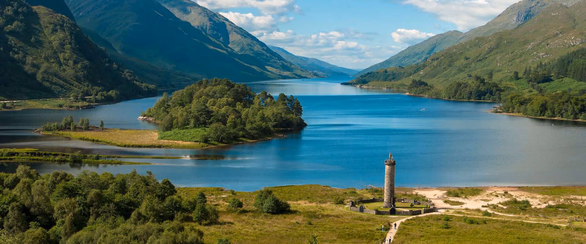 Loch Shiel running south-west between the hills, the Glenfinnan monument standing above its shore